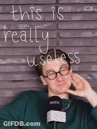 A Man Wearing Glasses And A Rode Microphone With The Words " This Is Really Useless " Above Him GIF
