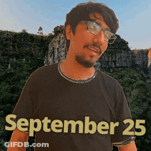 A Man Wearing Glasses And A September 25 Shirt GIF