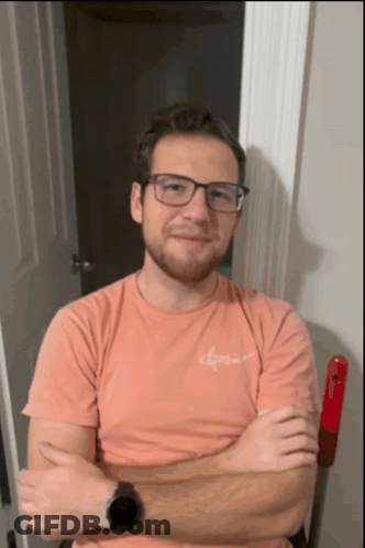 A Man Wearing Glasses And A Shirt That Says Abercrombie On It GIF