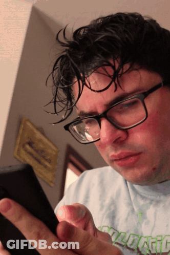 A Man Wearing Glasses And A Shirt That Says " Ecological " GIF