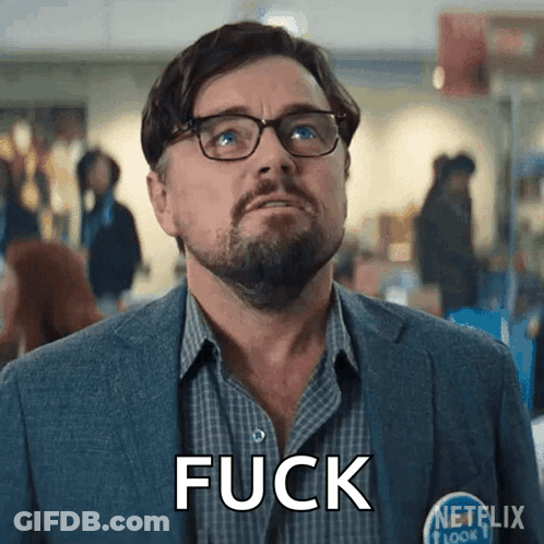 A Man Wearing Glasses And A Shirt That Says Fuck GIF