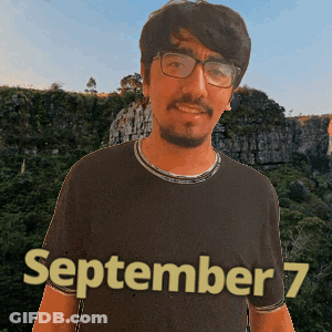 A Man Wearing Glasses And A Shirt That Says September 7 On It GIF