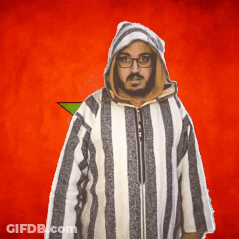 A Man Wearing Glasses And A Striped Jacket Has A Hood On GIF