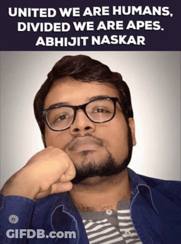 A Man Wearing Glasses And A Striped Shirt With The Words United We Are Humans Divided We Are Apes Written Above Him GIF