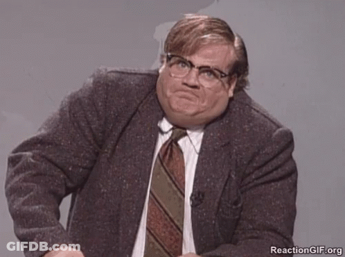 A Man Wearing Glasses And A Suit Has A Reaction Gif.org Watermark GIF
