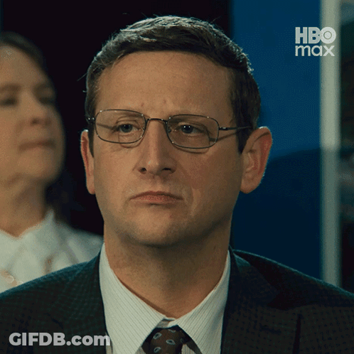 A Man Wearing Glasses And A Suit Has Hbo Max Written On The Bottom GIF