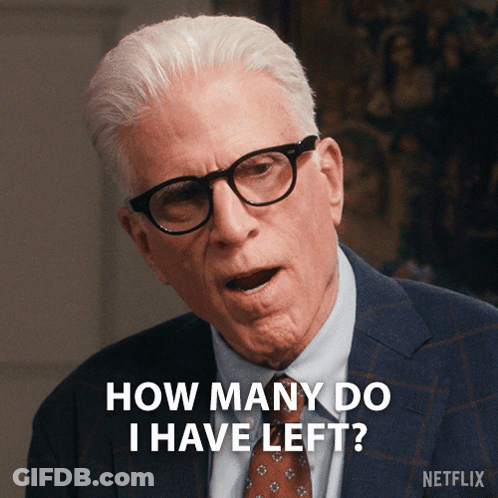 A Man Wearing Glasses And A Suit Is Asking How Many Do I Have Left GIF