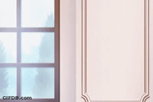 A Man Wearing Glasses And A Suit Is Looking At Something GIF