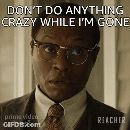 A Man Wearing Glasses And A Suit Says Do N't Do Anything Crazy While I 'M Gone GIF