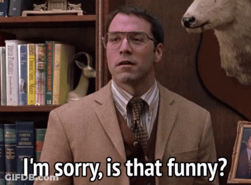 A Man Wearing Glasses And A Suit Says I 'M Sorry Is That Funny GIF