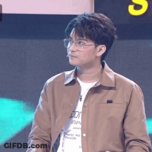 A Man Wearing Glasses And A T-Shirt That Says Odi GIF