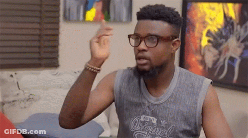 A Man Wearing Glasses And A Tank Top That Says " Original " On It GIF