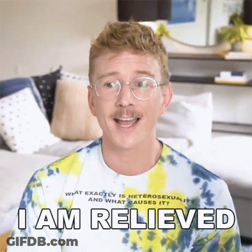 A Man Wearing Glasses And A Tie Dye Shirt Is Saying I Am Relieved GIF