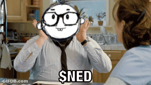 A Man Wearing Glasses And A Tie Has A Cartoon Face On His Head That Says Sned GIF
