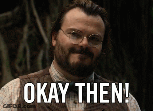 A Man Wearing Glasses And A Vest Says " Okay Then " GIF