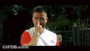 Man With Glasses In White And Red Nike Shirt GIF