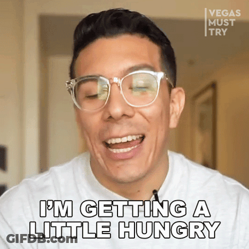 A Man Wearing Glasses And A White Shirt Says I 'M Getting A Little Hungry GIF