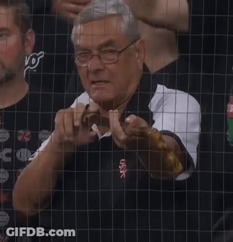 A Man Wearing Glasses And A White Sox Shirt GIF