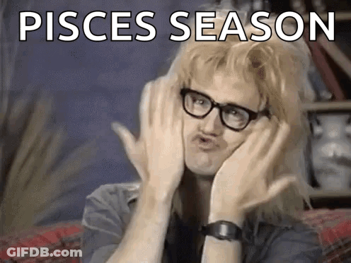 A Man Wearing Glasses And A Wig Is Making A Funny Face While Holding His Hands To His Face . GIF