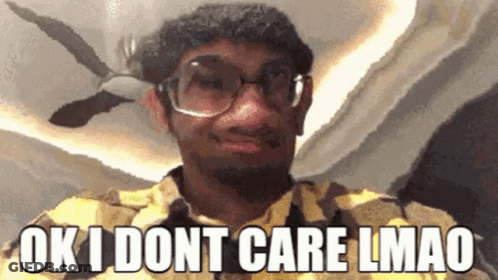 A Man Wearing Glasses And A Yellow Shirt Says Ok I Dont Care Lmao GIF