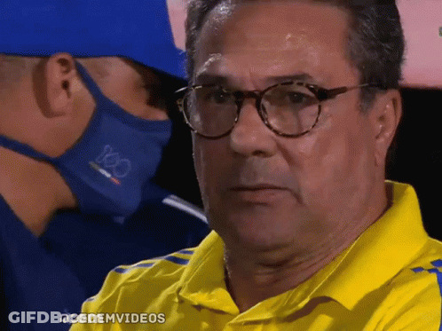 A Man Wearing Glasses And A Yellow Shirt With The Hashtag Acecemvideos On The Bottom GIF