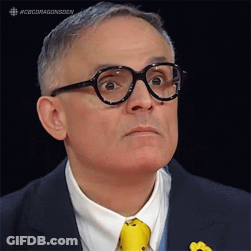 A Man Wearing Glasses And A Yellow Tie With The Hashtag #Cbcdragonsden On The Bottom GIF