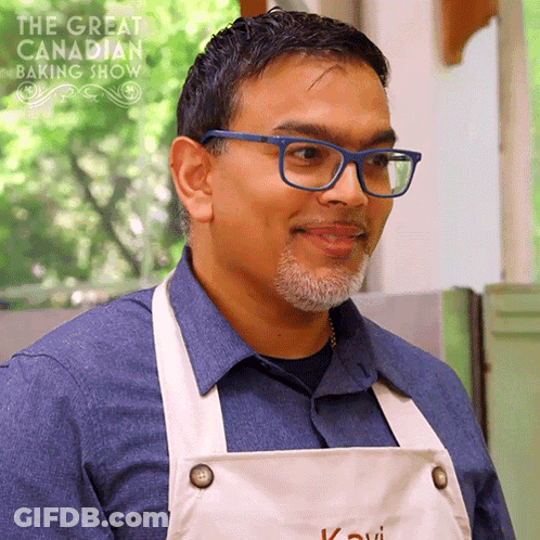 Man Wearing Glasses And Apron With Baking Show Logo GIF