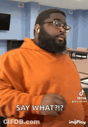 Man In Orange Hoodie Say What GIF