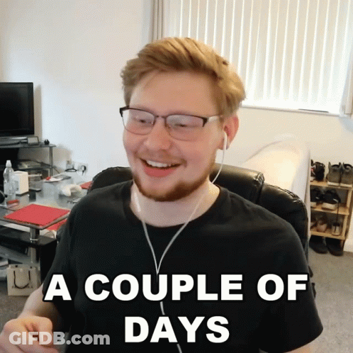 A Man Wearing Glasses And Ear Buds Is Smiling With The Caption A Couple Of Days GIF