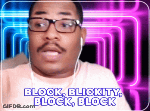 A Man Wearing Glasses And Ear Buds Says " Block Blickity Block Block " GIF