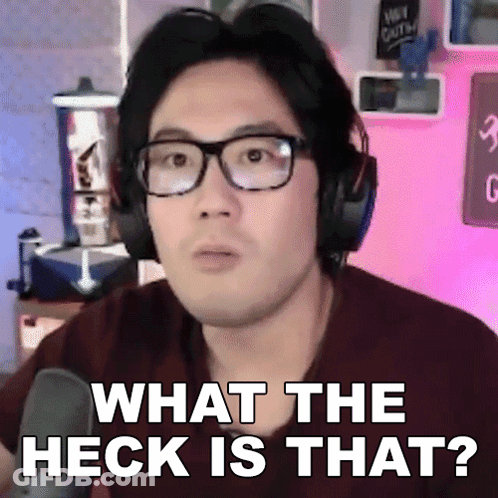A Man Wearing Glasses And Headphones Is Asking What The Heck Is That GIF