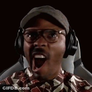 A Man Wearing Glasses And Headphones Is Making A Funny Face . GIF