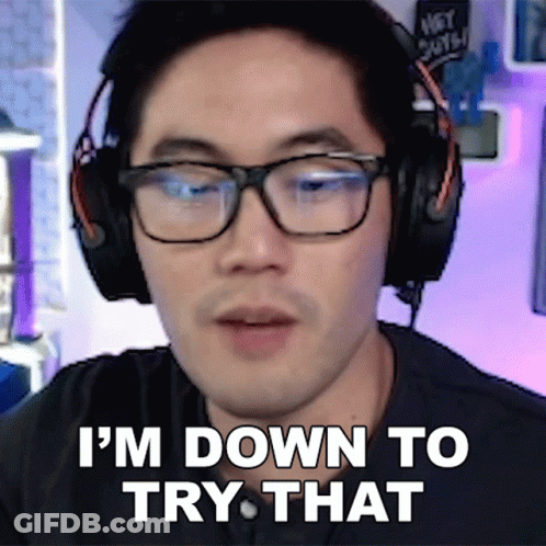 A Man Wearing Glasses And Headphones Is Saying I 'M Down To Try That GIF