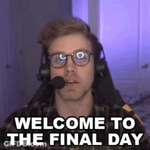 A Man Wearing Glasses And Headphones Is Sitting In A Chair With A Microphone In His Mouth . GIF