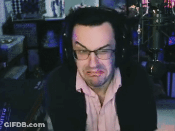 A Man Wearing Glasses And Headphones Making A Face GIF