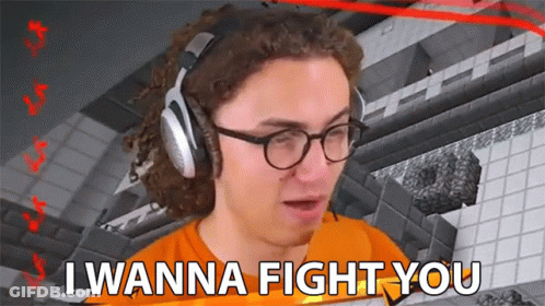 A Man Wearing Glasses And Headphones Says I Wanna Fight You GIF