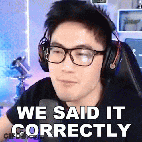 A Man Wearing Glasses And Headphones Says We Said It Correctly In Front Of A Microphone GIF