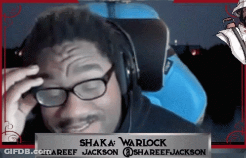 A Man Wearing Glasses And Headphones With The Name Shaka Warlock On The Bottom GIF