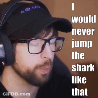 A Man Wearing Glasses And Headphones With The Words I Would Never Jump The Shark Like That GIF
