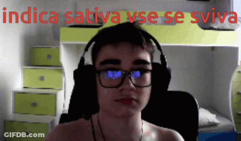 A Man Wearing Glasses And Headphones With The Words Indica Sativa Sve Se Sviva Written Above Him GIF