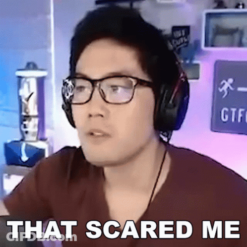 A Man Wearing Glasses And Headphones With The Words That Scared Me Above Him GIF