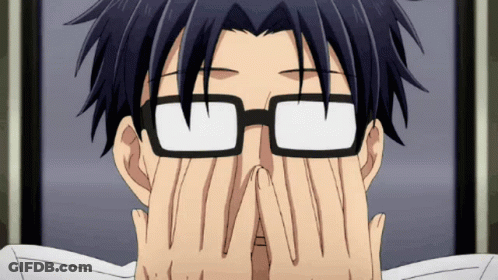 A Man Wearing Glasses Covers His Face With His Hands GIF
