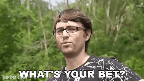 A Man Wearing Glasses Is Asking What 'S Your Bet While Standing In Front Of Trees . GIF