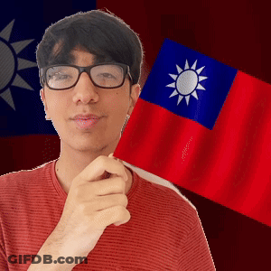 A Man Wearing Glasses Is Holding A Small Flag In Front Of A Taiwan Flag GIF