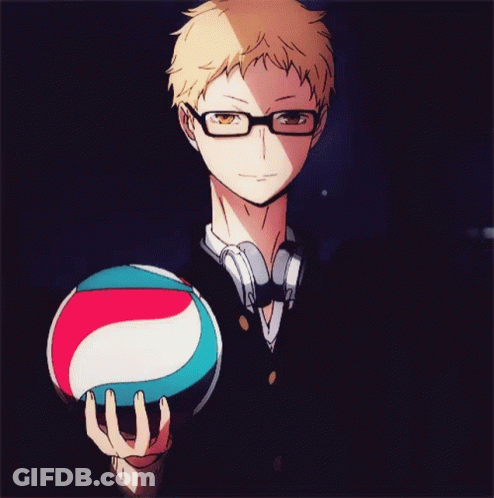 A Man Wearing Glasses Is Holding A Volleyball GIF