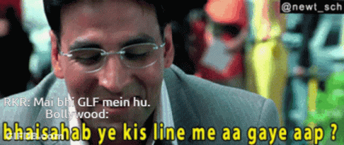 A Man Wearing Glasses Is Laughing With The Caption Rkr Mai Bh Glf Mein Hu GIF