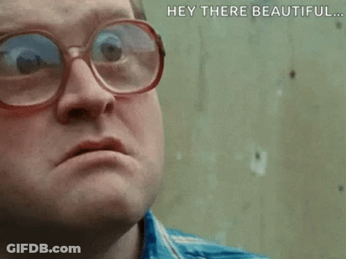 A Man Wearing Glasses Is Making A Funny Face . GIF