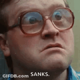 A Man Wearing Glasses Is Making A Funny Face And Saying `` Sanks '' . GIF