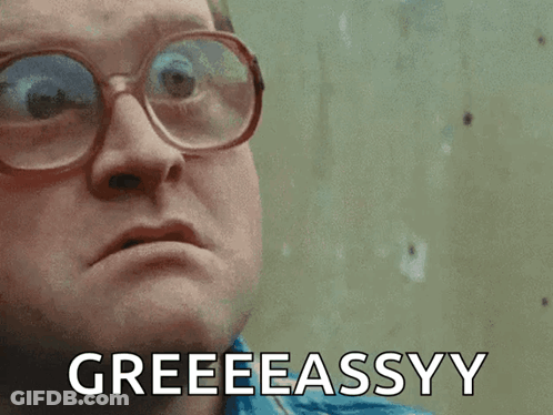 A Man Wearing Glasses Is Making A Funny Face And Says Greeeeassyy GIF