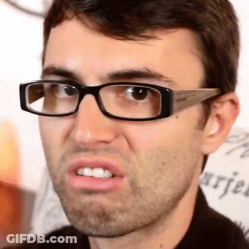 A Man Wearing Glasses Is Making A Funny Face In Front Of A Sign That Says " Happiness " GIF